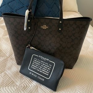 *New Never Used* Coach signature coated with smooth leather.  Gold/Brown Black.